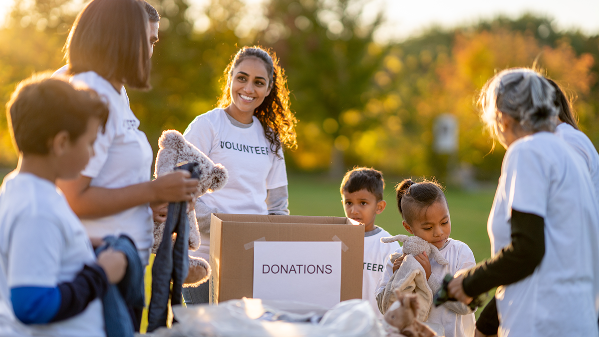 Community members volunteering together outdoors